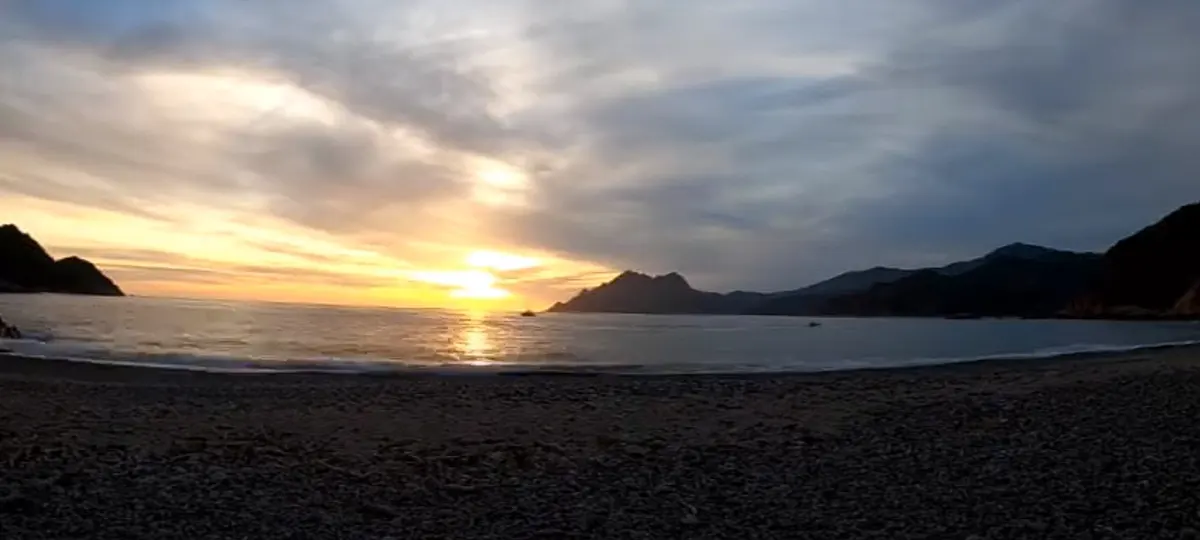 Coucher de soleil sur la plage de Porto